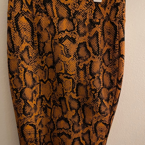 Thalia Sodi Dresses & Skirts - New without tag! Thali Sodi Zippered Python Print Pencil Skirt
